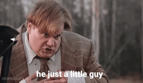 A Man In A Suit And Tie With The Words He Just A Little Guy Above Him GIF