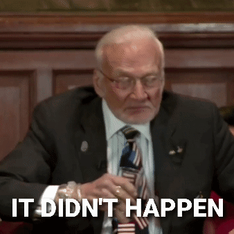 A Man In A Suit And Tie With The Words It Did N't Happen Below Him GIF