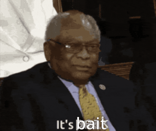 A Man In A Suit And Tie With The Words It 'S Bait Below Him GIF