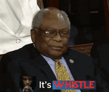 A Man In A Suit And Tie With The Words It 'S Whistle Behind Him GIF
