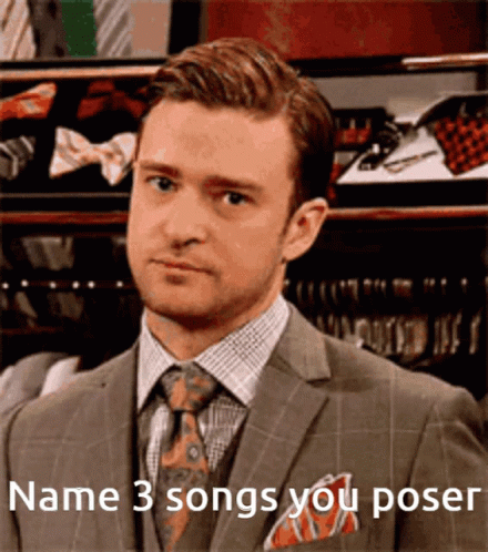 A Man In A Suit And Tie With The Words " Name 3 Songs You Poser " On The Bottom GIF