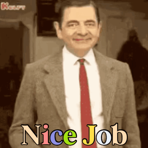 A Man In A Suit And Tie With The Words Nice Job Written Below Him GIF