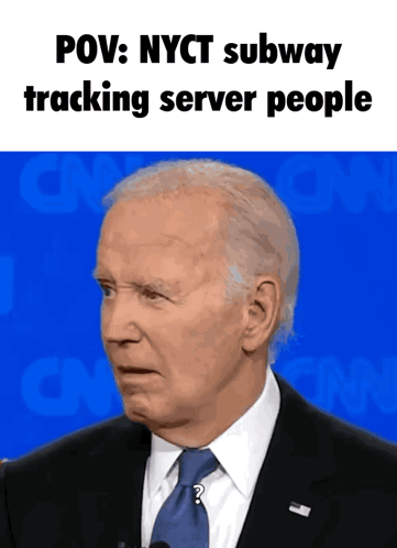 A Man In A Suit And Tie With The Words Pov Nyct Subway Tracking Server People Above Him GIF