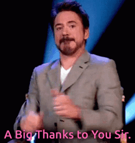 A Man In A Suit Applauds With The Words " A Big Thanks To You Sir " Below Him GIF