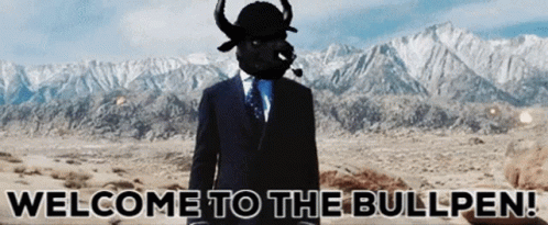 A Man In A Suit Has A Bull Mask On His Head And The Words Welcome To The Bullpen Below Him GIF