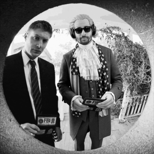 A Man In A Suit Has A Fbi Badge GIF