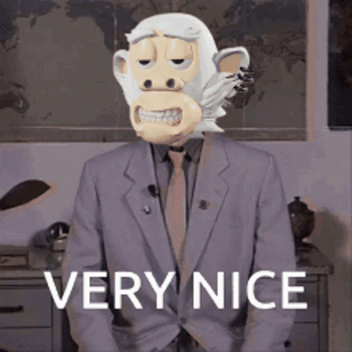 A Man In A Suit Has A Monkey Mask On His Head And The Words Very Nice Behind Him GIF