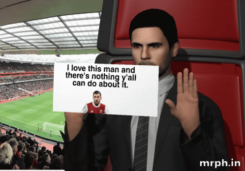 A Man In A Suit Holds Up A Sign That Says I Love This Man GIF