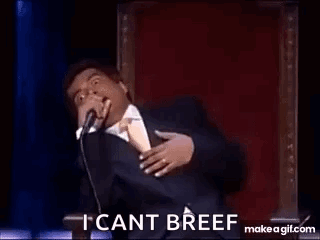 A Man In A Suit Is Dancing On A Stage With The Words `` I Can 'T Breef '' . GIF