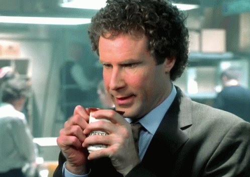 Man In Suit Drinking From Mrs. Pepper Cup GIF