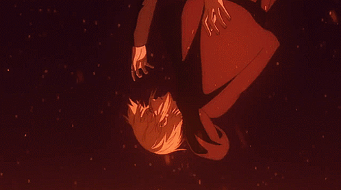 A Man In A Suit Is Falling Down In The Dark GIF