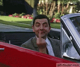 A Man In A Suit Is Giving The Middle Finger GIF