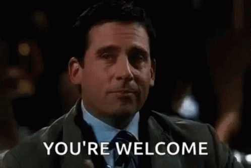 Man In Suit Holding Whiskey Saying You're Welcome GIF