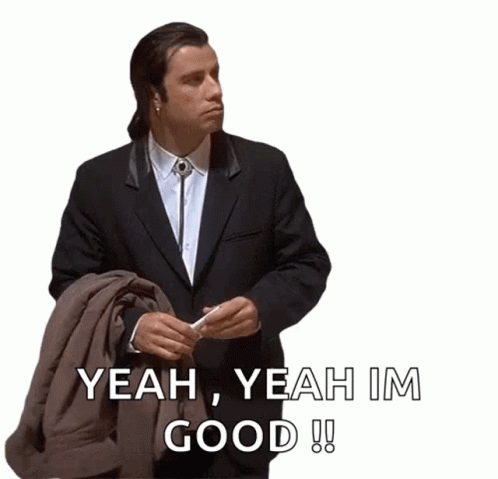 A Man In A Suit Is Holding A Jacket And Saying Yeah Yeah Im Good GIF