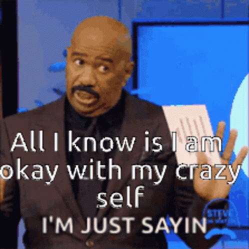A Man In A Suit Is Holding A Piece Of Paper And Says All I Know Is I Am Okay With My Crazy Self GIF