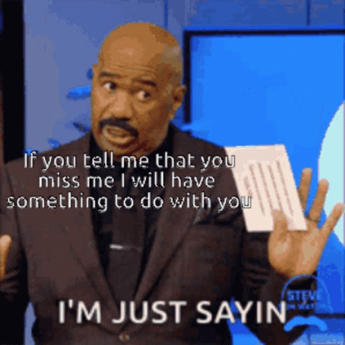 A Man In A Suit Is Holding A Piece Of Paper And Says " If You Tell Me That You Miss Me GIF