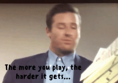A Man In A Suit Is Holding A Piece Of Paper With The Words " The More You Play The Harder It Gets " Below Him GIF
