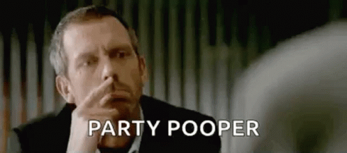 A Man In A Suit Is Holding His Finger To His Nose And Says `` Party Pooper '' . GIF