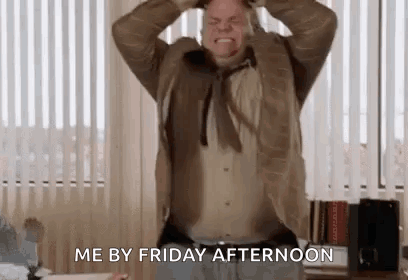 A Man In A Suit Is Holding His Head In His Hands And Screaming . GIF
