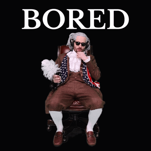 A Man In A Suit Is Laying In A Chair With The Word Bored Above Him GIF