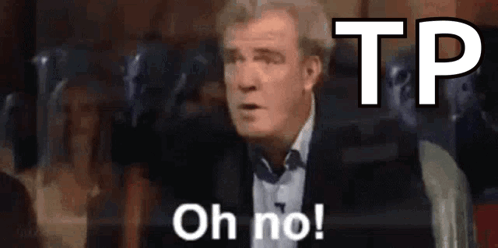 A Man In A Suit Is Making A Funny Face And Saying Oh No ! GIF