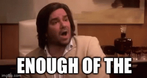 A Man In A Suit Is Making A Funny Face With The Words `` Enough Of The '' Written Above Him . GIF