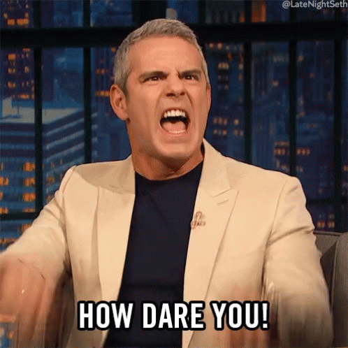 A Man In A Suit Is Screaming And Saying How Dare You . GIF