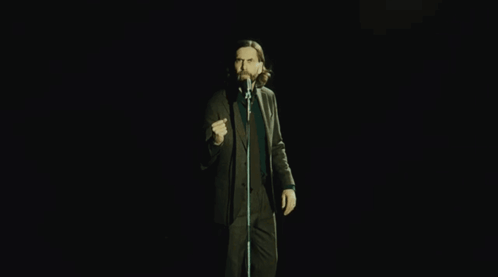 Man In Suit Singing Into Microphone GIF