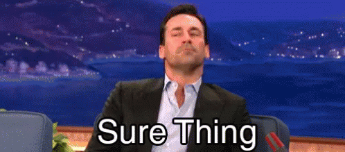 A Man In A Suit Is Sitting In A Chair With His Eyes Closed And Says Sure Thing GIF