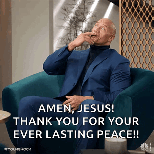 A Man In A Suit Is Sitting In A Chair With The Caption Amen Jesus Thank You For Your Ever Lasting Peace GIF
