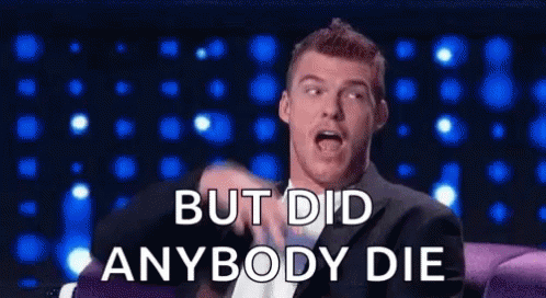 A Man In A Suit Is Sitting On A Couch And Saying `` But Did Anybody Die '' GIF