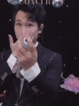 A Man In A Suit Is Spraying Something With The Words Have A Great Start In The New Week .. GIF