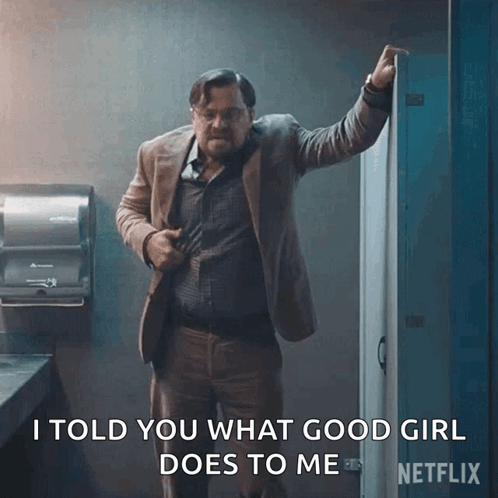 A Man In A Suit Is Standing In A Bathroom And Says I Told You What Good Girl Does To Me On The Screen GIF