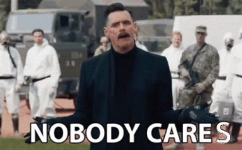 A Man In A Suit Is Standing In Front Of A Group Of Soldiers With The Words Nobody Cares Written Above Him . GIF