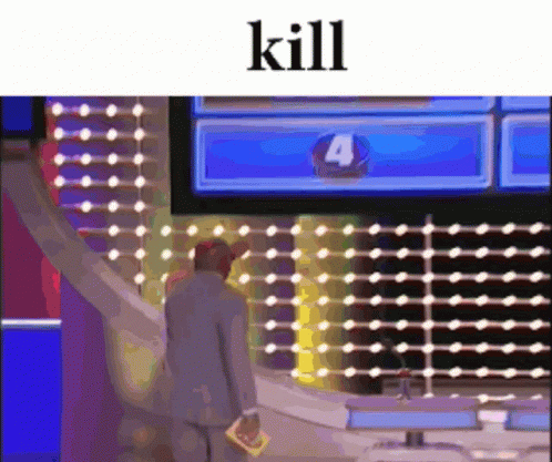 A Man In A Suit Is Standing In Front Of A Screen With The Number Four On It . GIF