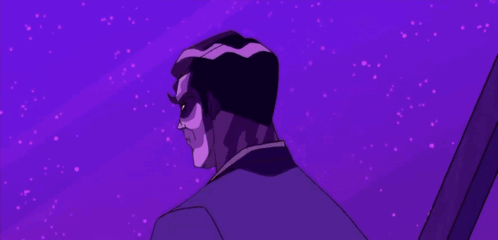 A Man In A Suit Is Standing Next To A Man In A Red Shirt GIF