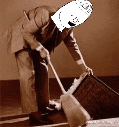 A Man In A Suit Is Sweeping The Floor With A Cartoon Character On His Head GIF