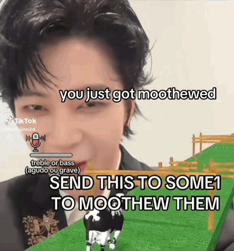 A Man In A Suit Is Talking Into A Microphone And Says `` You Just Got Moothewed '' . GIF