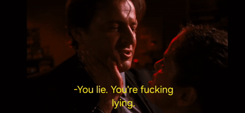 A Man In A Suit Is Talking To Another Man In A Dark Room With The Words - You Lie You 'Re Fucking Lying GIF