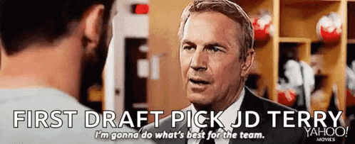 A Man In A Suit Is Talking To Another Man With The Words First Draft Pick Jd Terry GIF