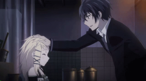 A Man In A Suit Is Touching The Head Of A Girl With A Tattoo That Says Lxxi GIF