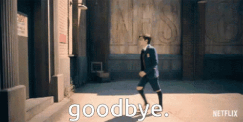 A Man In A Suit Is Walking Down A Street With The Words Goodbye Written On The Ground . GIF