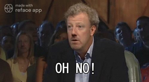 A Man In A Suit Says " Anyway " In Front Of A Crowd Of People GIF