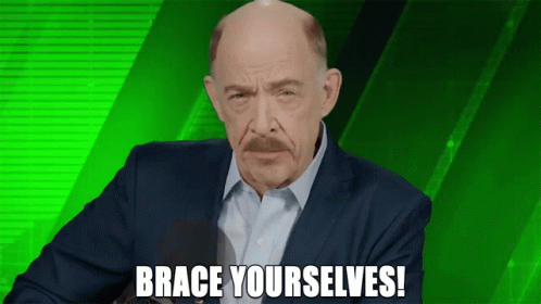 A Man In A Suit Says Brace Yourselfs In Front Of A Green Background GIF