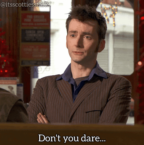 A Man In A Suit Says " Don T You Dare " GIF