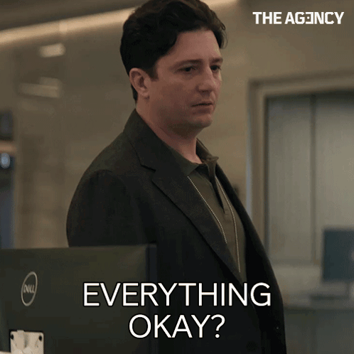 a man in a suit says everything okay