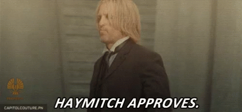 A Man In A Suit Says Haymitch Approves GIF