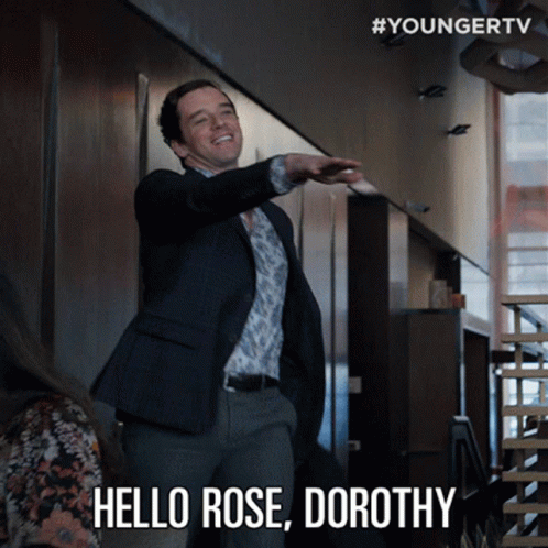 A Man In A Suit Says Hello Rose Dorothy In A Video GIF
