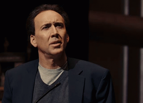 A Man In A Suit Says " How Absurd " In Front Of Him GIF