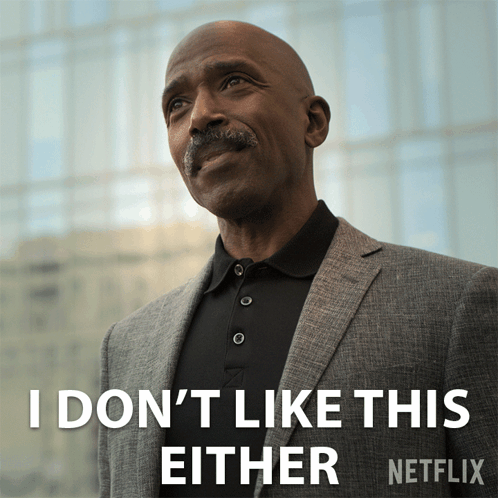 A Man In A Suit Says I Don T Like This Either GIF